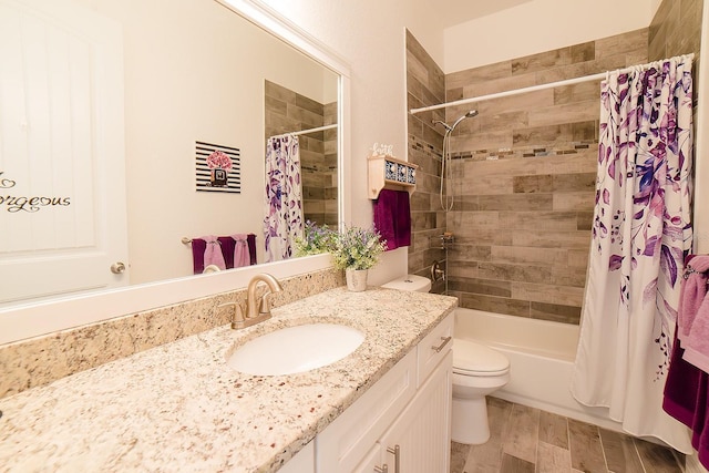 full bathroom with vanity, toilet, and shower / bath combo