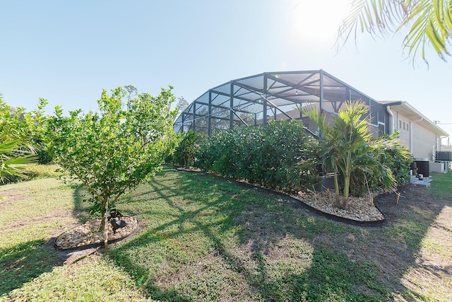 view of yard featuring a lanai