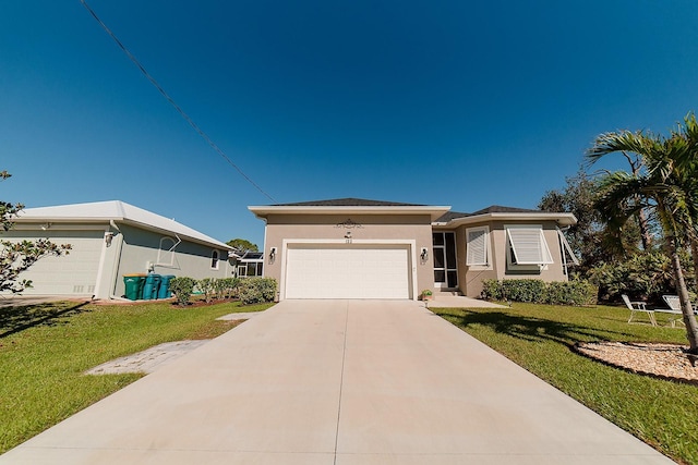 view of front facade featuring a front lawn and a garage