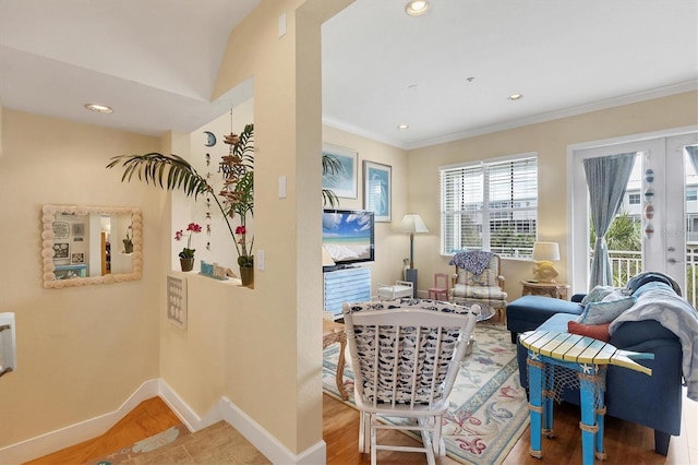 10390 Longshore Rd Unit 82, Placida, FL 33946 - sitting room featuring wood finished floors, ornamental molding, recessed lighting, and french doors