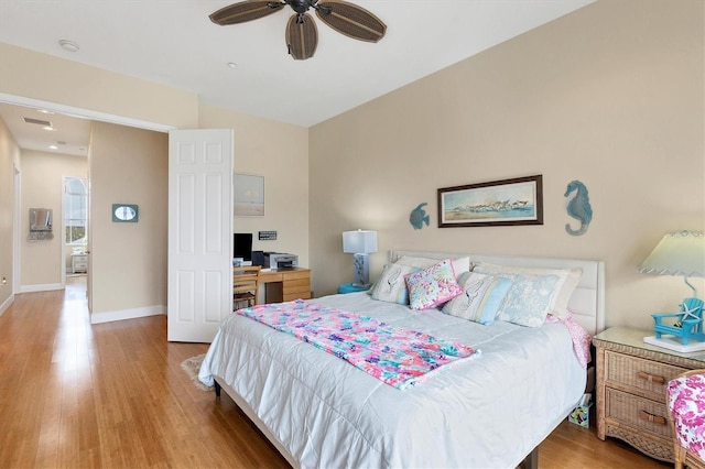 10390 Longshore Rd Unit 82, Placida, FL 33946 - bedroom with wood finished floors and ceiling fan
