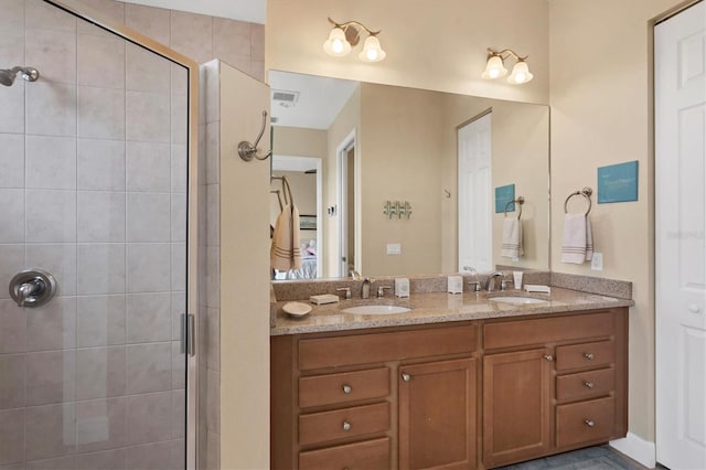 10390 Longshore Rd Unit 82, Placida, FL 33946 - bathroom featuring a shower stall and double vanity