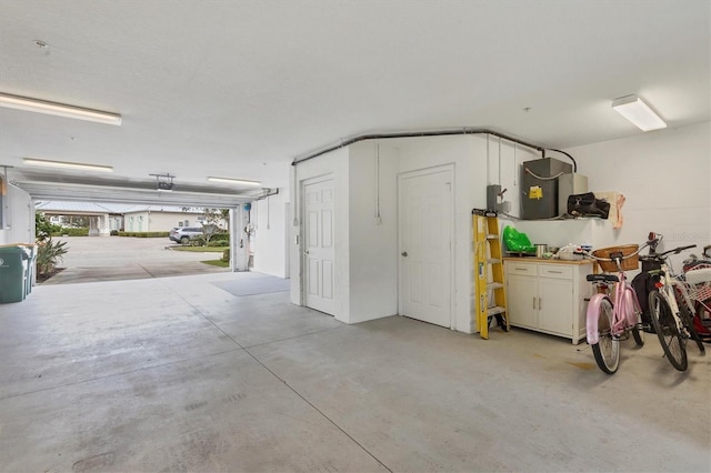 10390 Longshore Rd Unit 82, Placida, FL 33946 - garage featuring a garage door opener