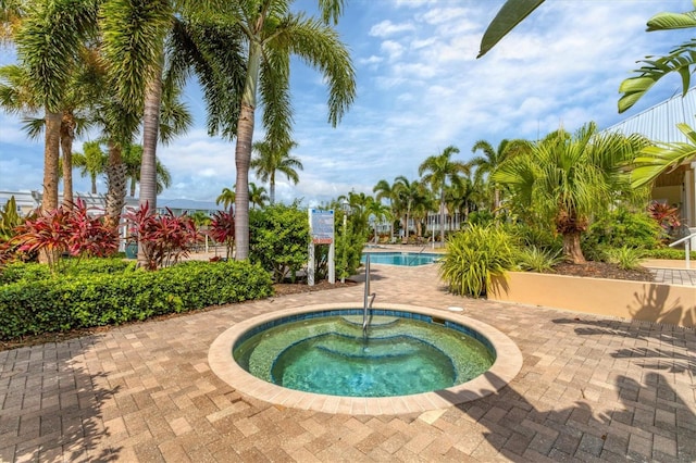 10390 Longshore Rd Unit 82, Placida, FL 33946 - community pool featuring a hot tub