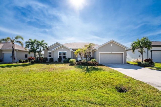 single story home featuring a garage and a front yard