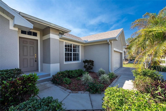 entrance to property with a garage