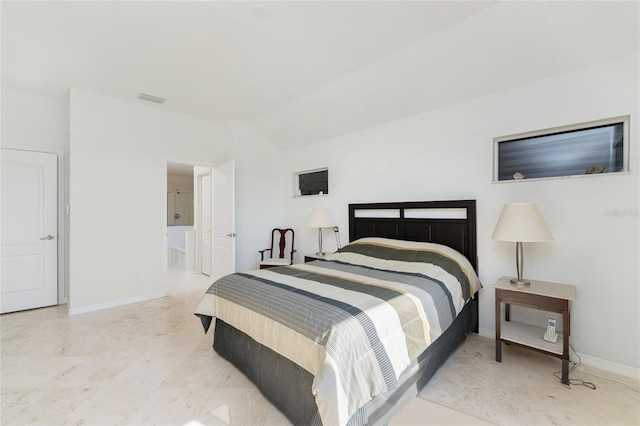 bedroom featuring ensuite bath