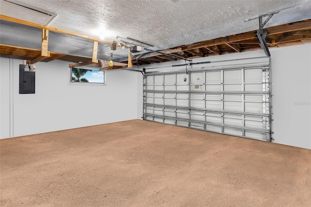 garage with electric panel and a garage door opener