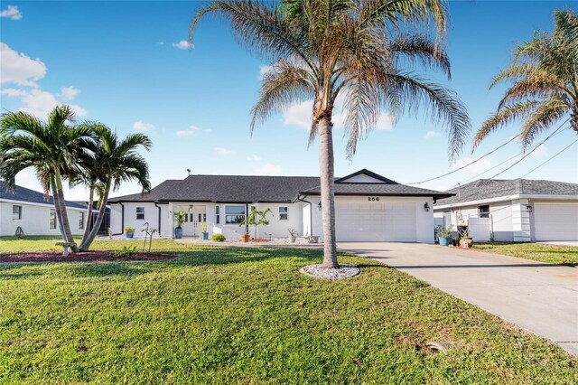 ranch-style house with a front lawn and a garage