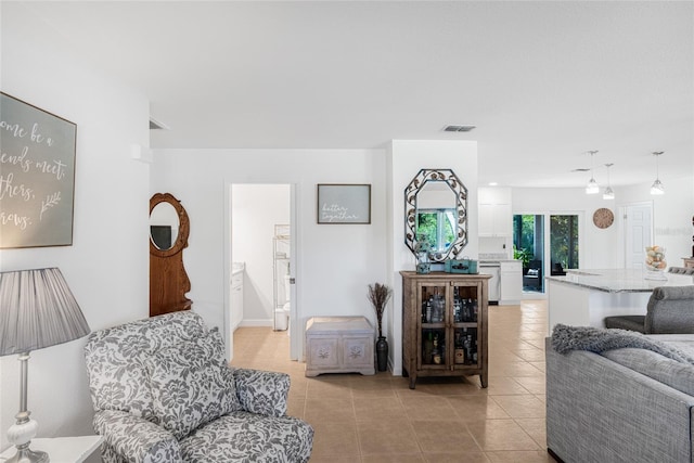 living room featuring light tile patterned flooring