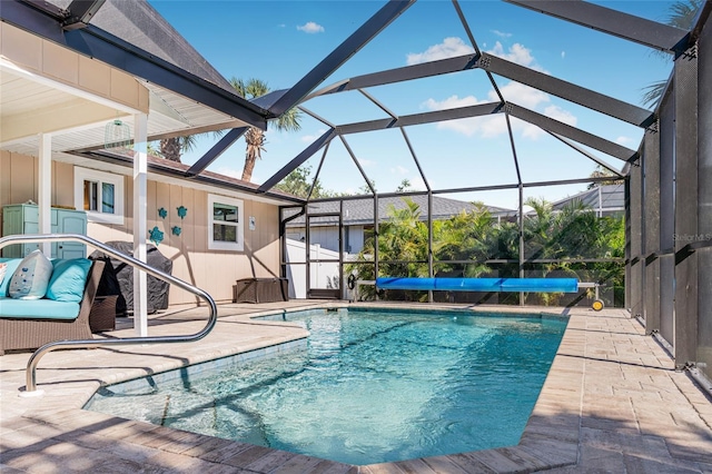 view of swimming pool featuring a lanai, a patio, and central AC