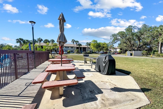 surrounding community featuring a yard