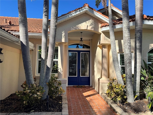 doorway to property featuring french doors