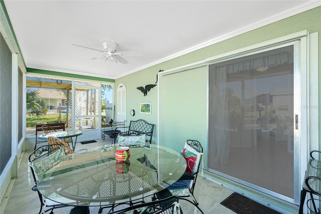 sunroom / solarium with ceiling fan