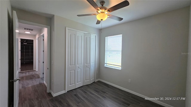 30072 Alder Rd, Punta Gorda, FL 33982 - unfurnished bedroom featuring a closet, dark wood-type flooring, and a ceiling fan