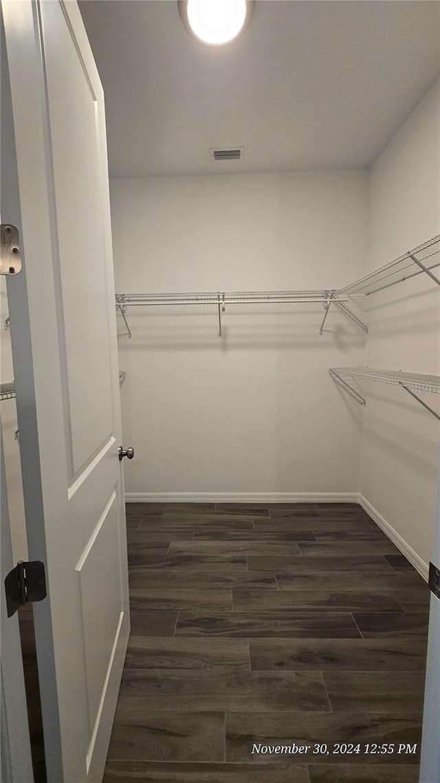 30072 Alder Rd, Punta Gorda, FL 33982 - spacious closet featuring dark wood-type flooring