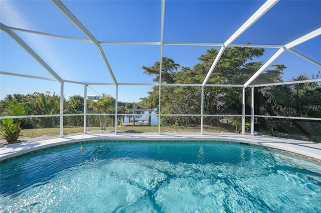 view of pool featuring a lanai