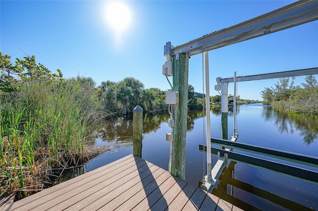 view of dock with a water view