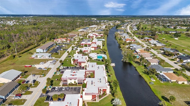 bird's eye view with a water view