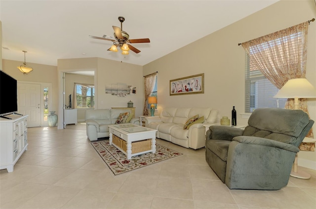 living room featuring ceiling fan and light tile patterned flooring