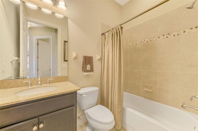 full bathroom featuring vanity, toilet, and shower / tub combo with curtain