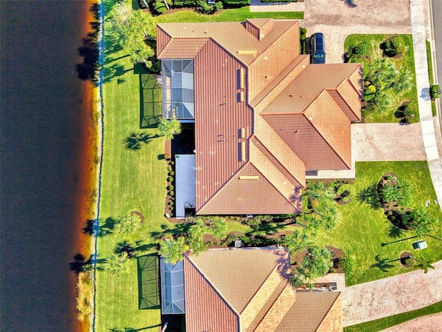 drone / aerial view with a water view