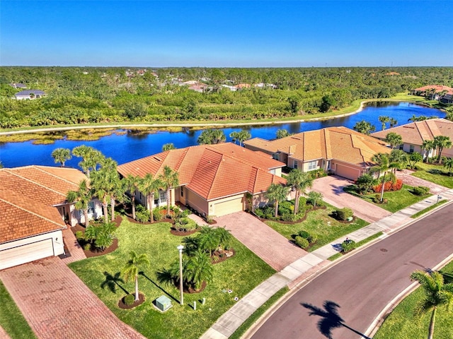 birds eye view of property featuring a water view