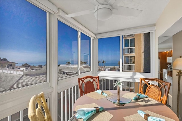 sunroom / solarium with ceiling fan