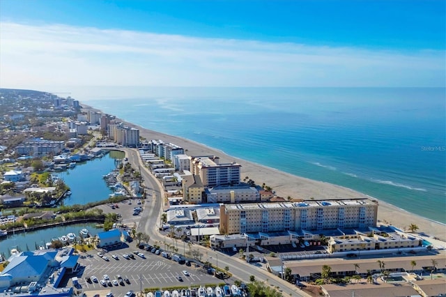 aerial view with a view of the beach and a water view