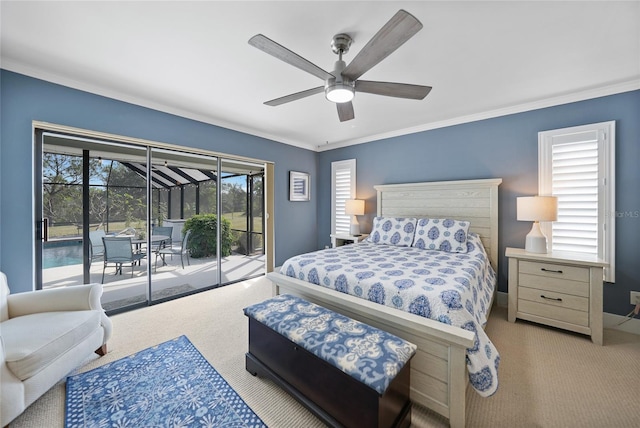 carpeted bedroom featuring access to outside, ceiling fan, and crown molding