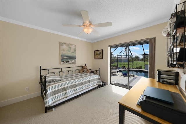 carpeted bedroom featuring a textured ceiling, ceiling fan, access to exterior, and crown molding