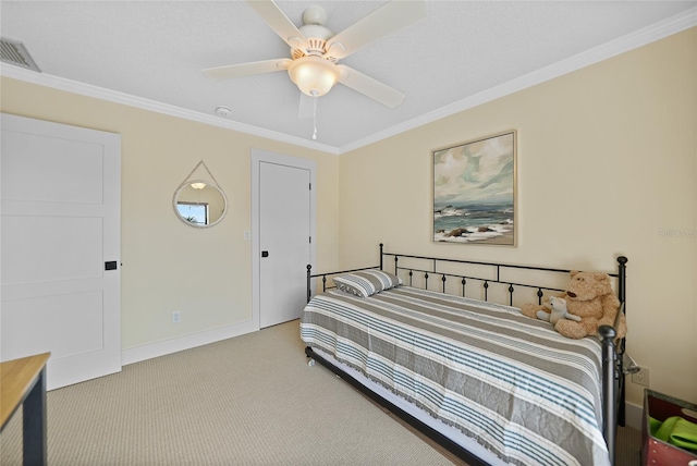 bedroom with ceiling fan, crown molding, and light carpet