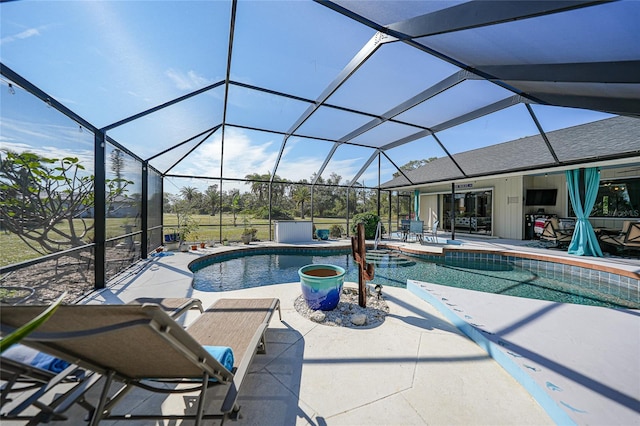 view of pool featuring a lanai and a patio area