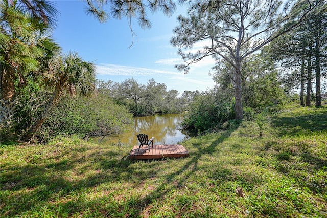 dock area featuring a water view