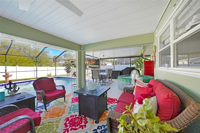 sunroom / solarium with a swimming pool