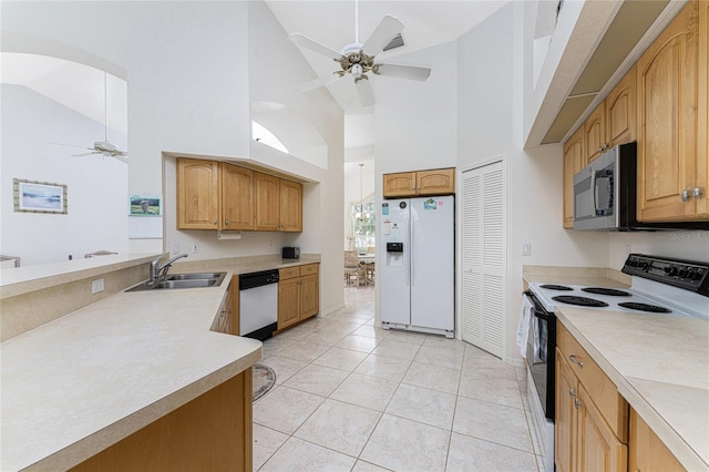 kitchen with white appliances, ceiling fan, sink, high vaulted ceiling, and light tile patterned flooring