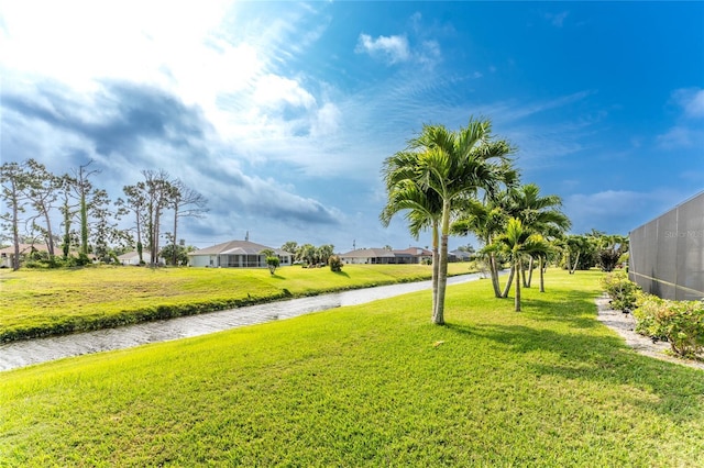 view of yard with a water view