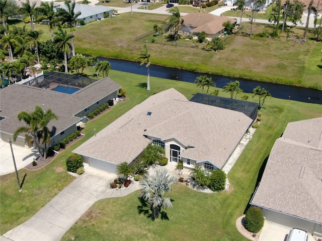 drone / aerial view featuring a water view