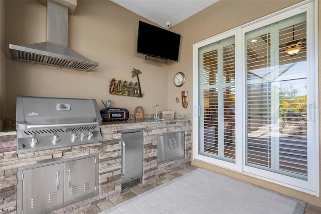 view of patio / terrace with an outdoor kitchen and area for grilling