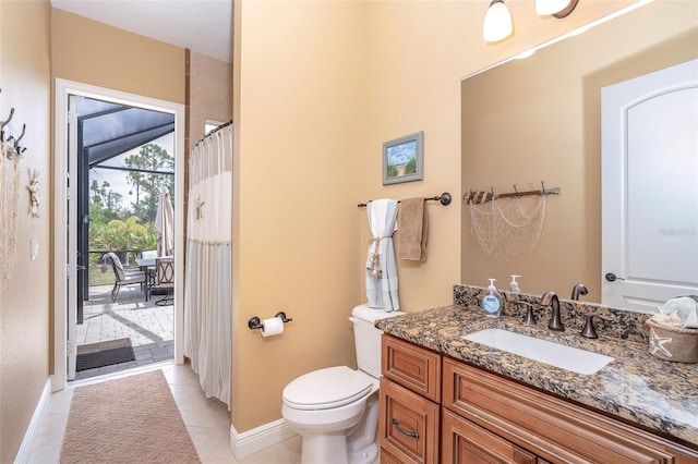 14010 San Domingo Blvd, Port Charlotte, FL 33981 - full bath featuring vanity, toilet, baseboards, and tile patterned flooring