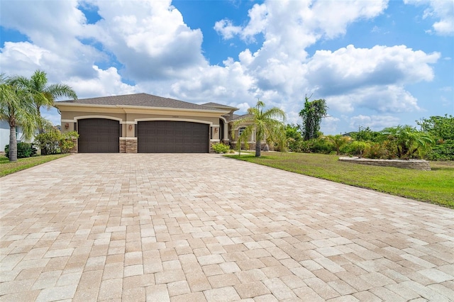 14010 San Domingo Blvd, Port Charlotte, FL 33981 - mediterranean / spanish-style home with decorative driveway, a garage, a front lawn, and stucco siding