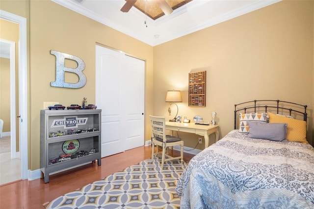 14010 San Domingo Blvd, Port Charlotte, FL 33981 - bedroom featuring ornamental molding, wood finished floors, baseboards, and a ceiling fan