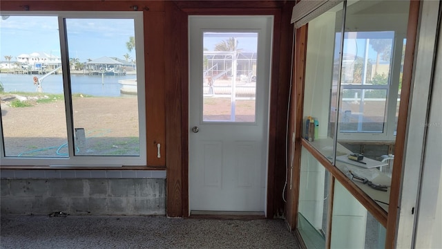 entryway featuring a water view