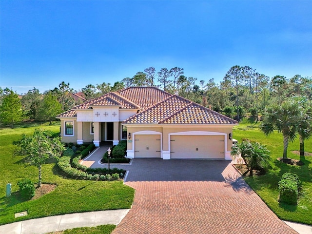 mediterranean / spanish-style house featuring a garage