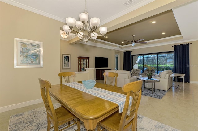 dining space featuring light tile patterned floors, ceiling fan with notable chandelier, and ornamental molding