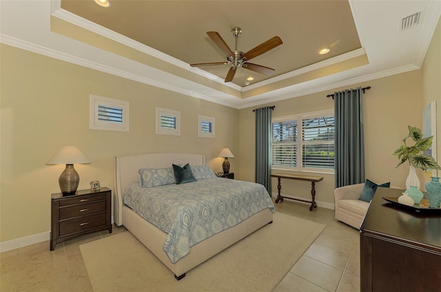 bedroom with a raised ceiling, ceiling fan, crown molding, and light tile patterned floors