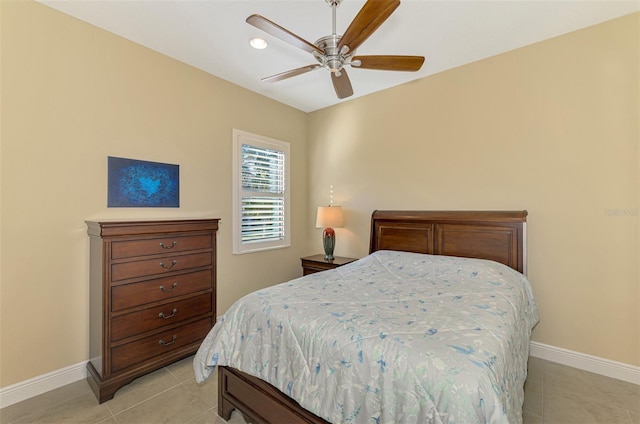 bedroom featuring ceiling fan and light tile patterned flooring