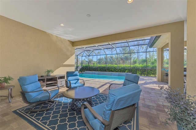 view of patio / terrace featuring a lanai