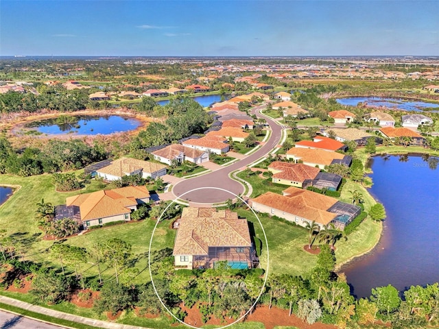 drone / aerial view with a water view