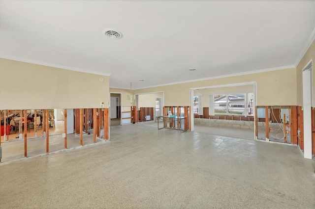 empty room featuring ornamental molding